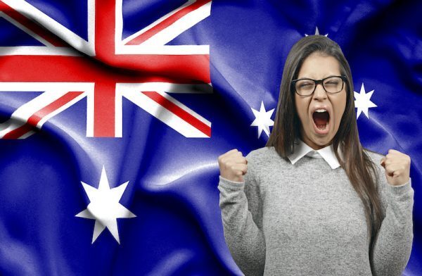 excited Australian lottery player with flag