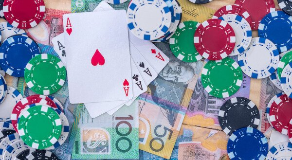 poker cards, chips and Australian money